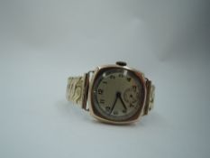 A gent's vintage 9ct rose gold wrist watch having Arabic numeral dial with subsidiary seconds in a
