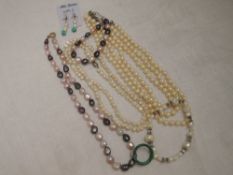 A selection of modern white and coloured baroque style jewellery and a malachite band ring