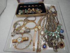 A selection of costume jewellery including ten wrist watches, fashion rings, pendants, earrings etc