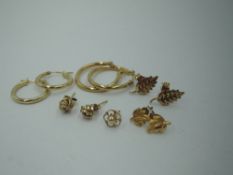 Five pairs of yellow metal and 9ct gold stud and hoop earrings of various forms, approx 3.7g