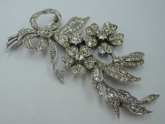 An HM silver articulated diamante floral spray brooch