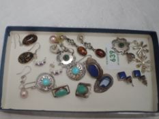 Nine pairs of white metal earrings, most stamped 925, of various forms