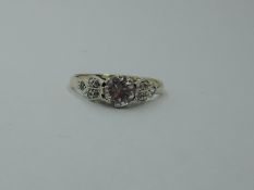 A cubic zirconia solitaire dress ring having set shoulders to a 9ct gold loop, size O & approx 2.2g