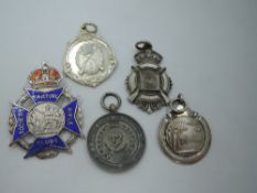 Four HM silver medalions including Rifle club interest and Stockton On Tees 1925 Railway