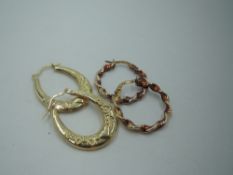 Two pairs of 9ct gold hoop earrings of twist and moulded form, approx 2.2g