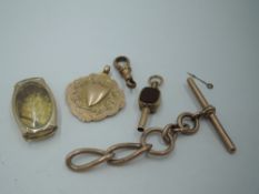 A small selection of 9ct gold including medalion, wrist watch face case, piece of watch chain and