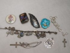 A small selection of silver and white metal jewellery including charm bracelet, Siam silver and