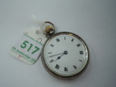 A small Edwardian silver top wound pocket watch having Roman numeral dial to white face in plain