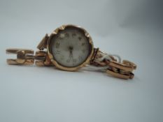 A vintage 9ct rose gold wrist watch with stretch strap stamped 9ct (AF), GW approx 21g