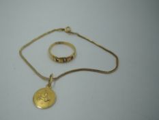 An 18ct gold snake link bracelet with zodiac charm, and a yellow metal band ring with ruby and