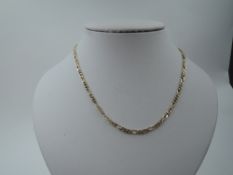 A 9ct gold figaro chain, approx 20' & 14.8g
