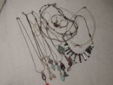 A selection of silver and white metal necklaces of various forms including hematite, bead etc and