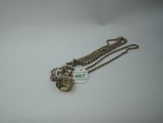 A yellow metal belcher link muff chain with 9ct gold fob having facet cut citrine style stone,no