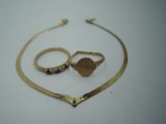 Three pieces of damaged 9ct gold jewellery including bracelet and two rings, total approx 3.2g