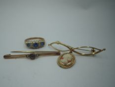 Three pieces of yellow metal jewellery stamped 375/9ct including bar brooch, cameo bar brooch and