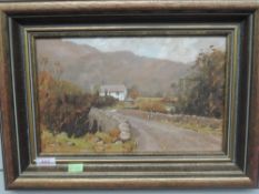 An oil painting on board, R Martin Tomlinson, Ulpha Bridge Duddon valley, signed and attributed