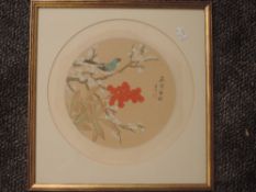 A silk fabric painting, circular, Oriental bird amidst foliage, 30cm dia, plus frame and glazed