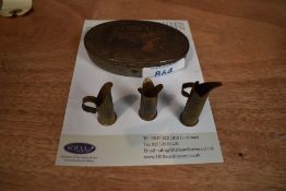 A small collection of WW1 Trench Art, a vase and two jugs made from bullet cases, one decorated with