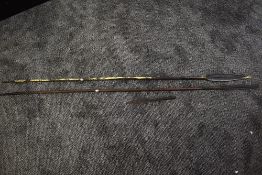 Two Tribal Spears having steel leaf shaped blades and steel pointed ends, lengths 155cm & 150cm