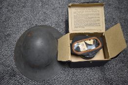 A WW2 Fire Helmet having label The Clerk of The Lancashire CC, Dyson & Horsfall Ltd and a WW2 Gas
