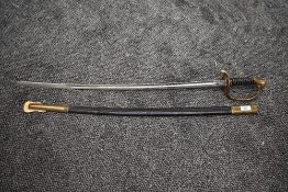 A Vanguard United States Marine Corp NCO Sword having decorated blade, with scabbard, scabbard