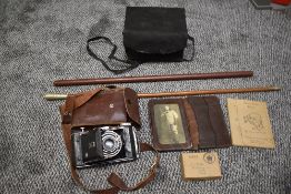A collection of Militaria including a RAF Service Wallet belonging to SGT Howson? No 4 Squadron No 5