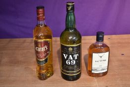 A bottle of Vat 69 Finest Scotch Whisky 40% vol 1 Litre, a bottle of Grants Blended Scotch Whisky