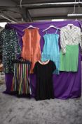 A selection of mixed vintage dresses including early 1950s grosgrain dress and patterned 60s