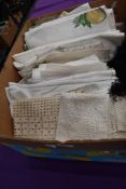 A collection of vintage and antique table linen including crotchet work and embroidered items.