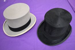 A vintage Harrods top hat and a later grey top hat.