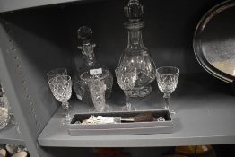 A Waterford crystal decanter and similar Webb decanter with four named claret glasses