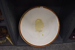 A large salt glazed butter or cream bowl having lost its internal glaze