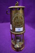 A coal or similar mine lamp by the Protector Lamp & Lighting co Type 6 No. B/28 Eccles