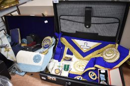A selection of Masonic regalia including tabards, medallions and sashes