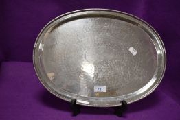 An arts and crafts style platter by Lakeland Rural Industries Borrowdale