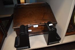 A Victorian writers slope having oak case with internal drawer and a pair of wall sconce