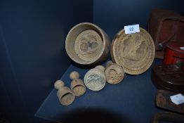 Four small farm house biscuit cutters and two larger examples all having harvest scenes