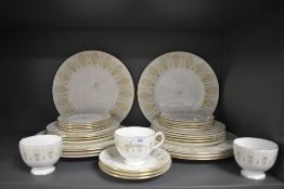 A part tea and dinner service by Royal Doulton in the Green Medina design