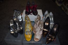 Seven pairs of ladies fashion high heels and shoes with boxes