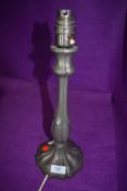 An arts and crafts styled pewter lamp base by Park