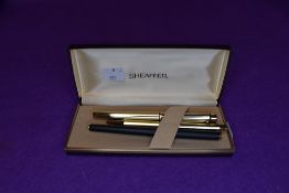Three fine desk top pens including Schaeffer gold plated fountain and ball point pen also Mont Blanc