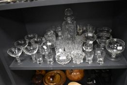 A selection of clear cut and crystal glass wares including Bohemian tumblers and sundae dishes