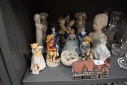 A selection of figures and figurines including Coalport Royal Worcester and Royal Doulton