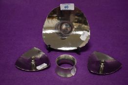 Two miniature candle sticks and a pin dish by Lakeland Rural Industries Borrowdale