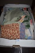 A selection of lace work and fabric table place mats etc
