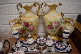 A selection of mantle vase and ceramic dressing table set