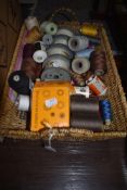 A selection of sewing threads and cotton reels
