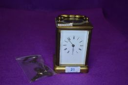 A French made carriage clock having brass case with glass gallery escape movement