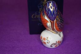 A ceramic Royal Crown Derby paper weight or figure of a Kingfisher having gold stopper and box