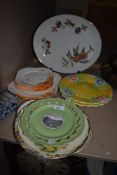 A selection of ceramic plates and serving dishes including Shelley china